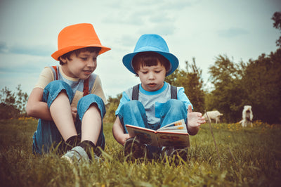 Kids reading donated books